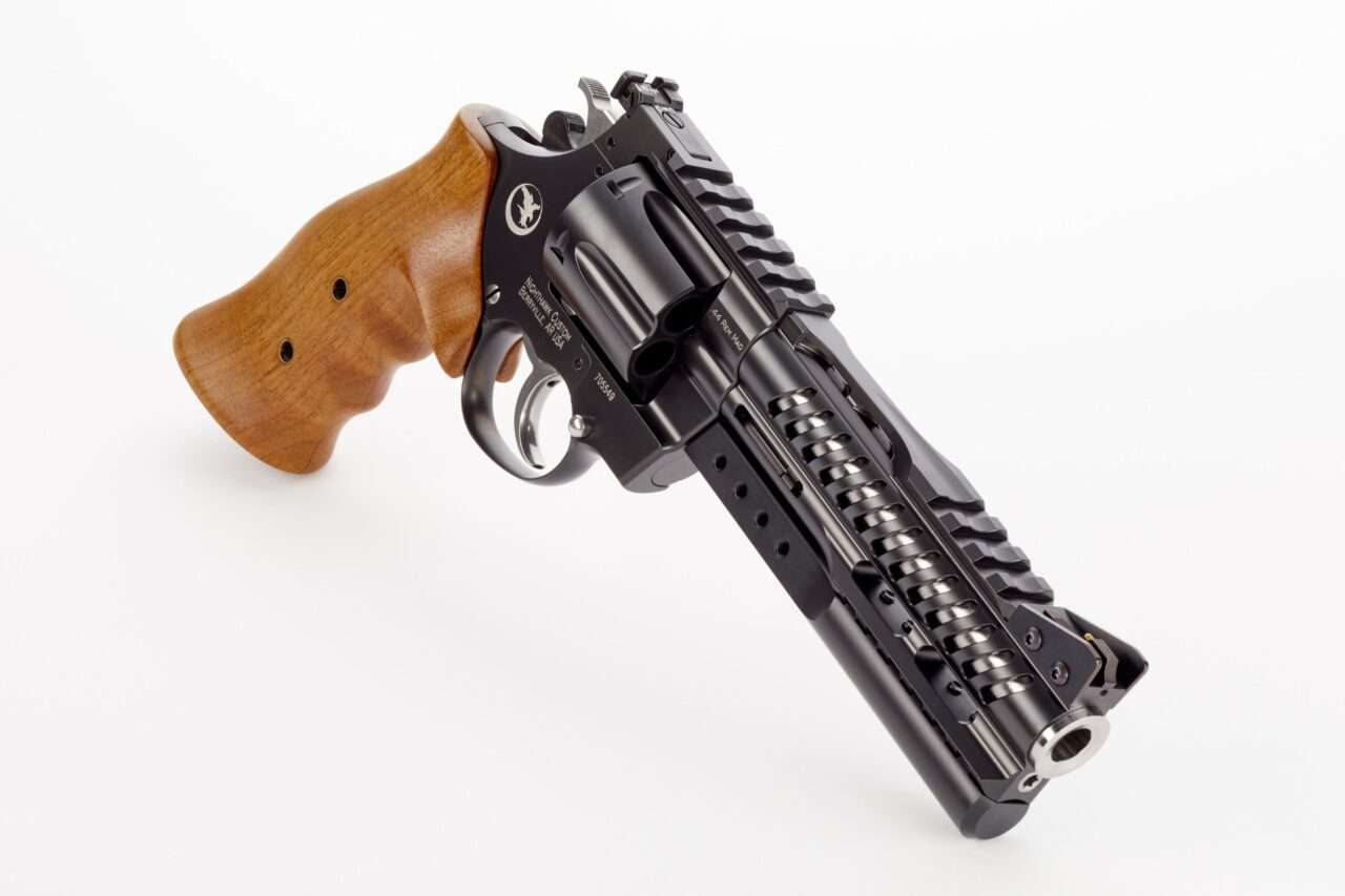 NIGHTHAWK KORTH NXR 6" .44MAG RIGHT SIDE VIEW LAYING FLAT WITH WEIGHT