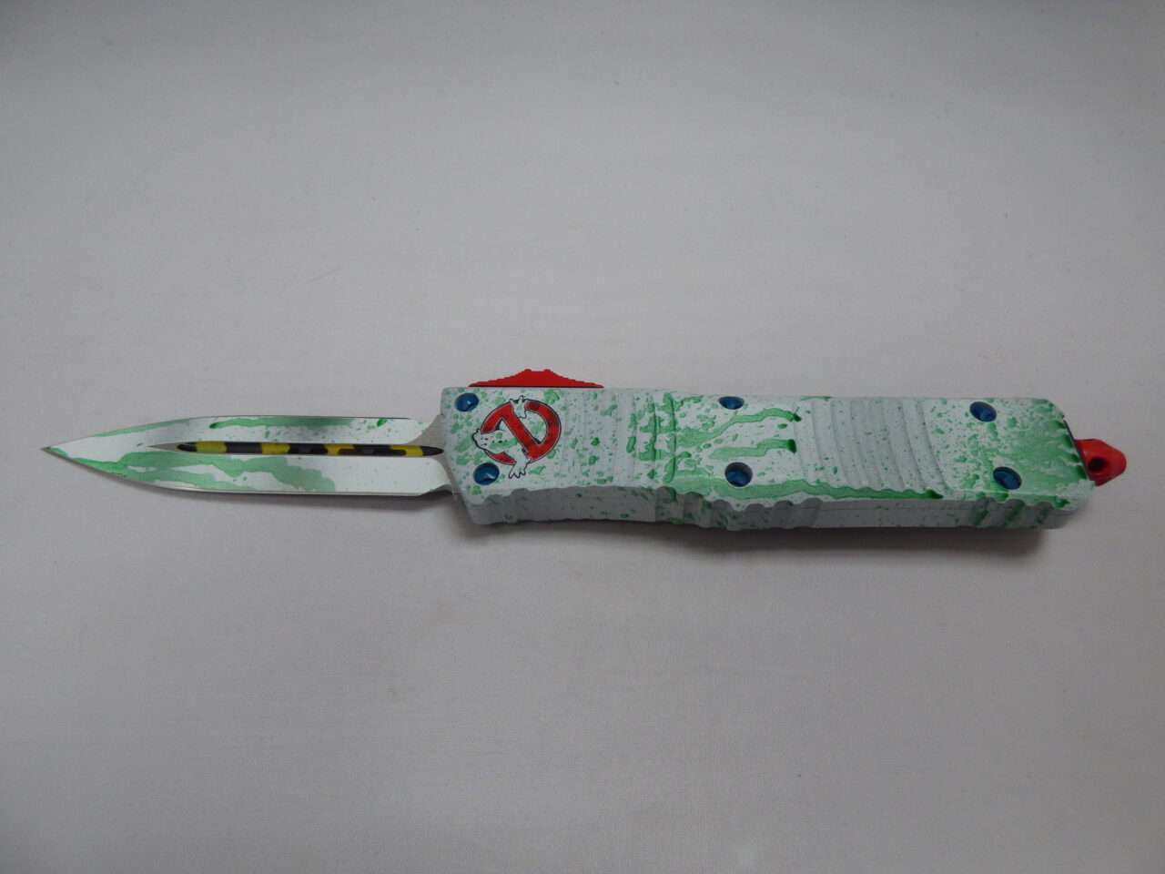 MICROTECH COMBAT TROODON DOUBLE EDGED SIGNATURE SERIES SLIME WHITE STANDARD GHOSTBUSTERS NON CLIP SIDE