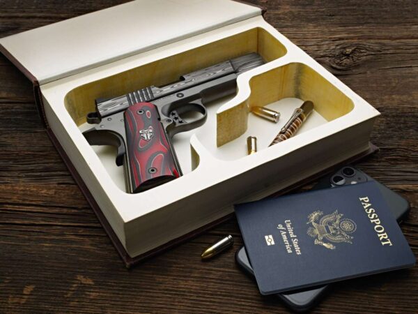 CABOT GUN OF THE MONTH 2023 JUNE 1911 BEDSIDE DEMON 9MM RIGHT SIDE VIEW TOP ANGLE IN CASE BOOK