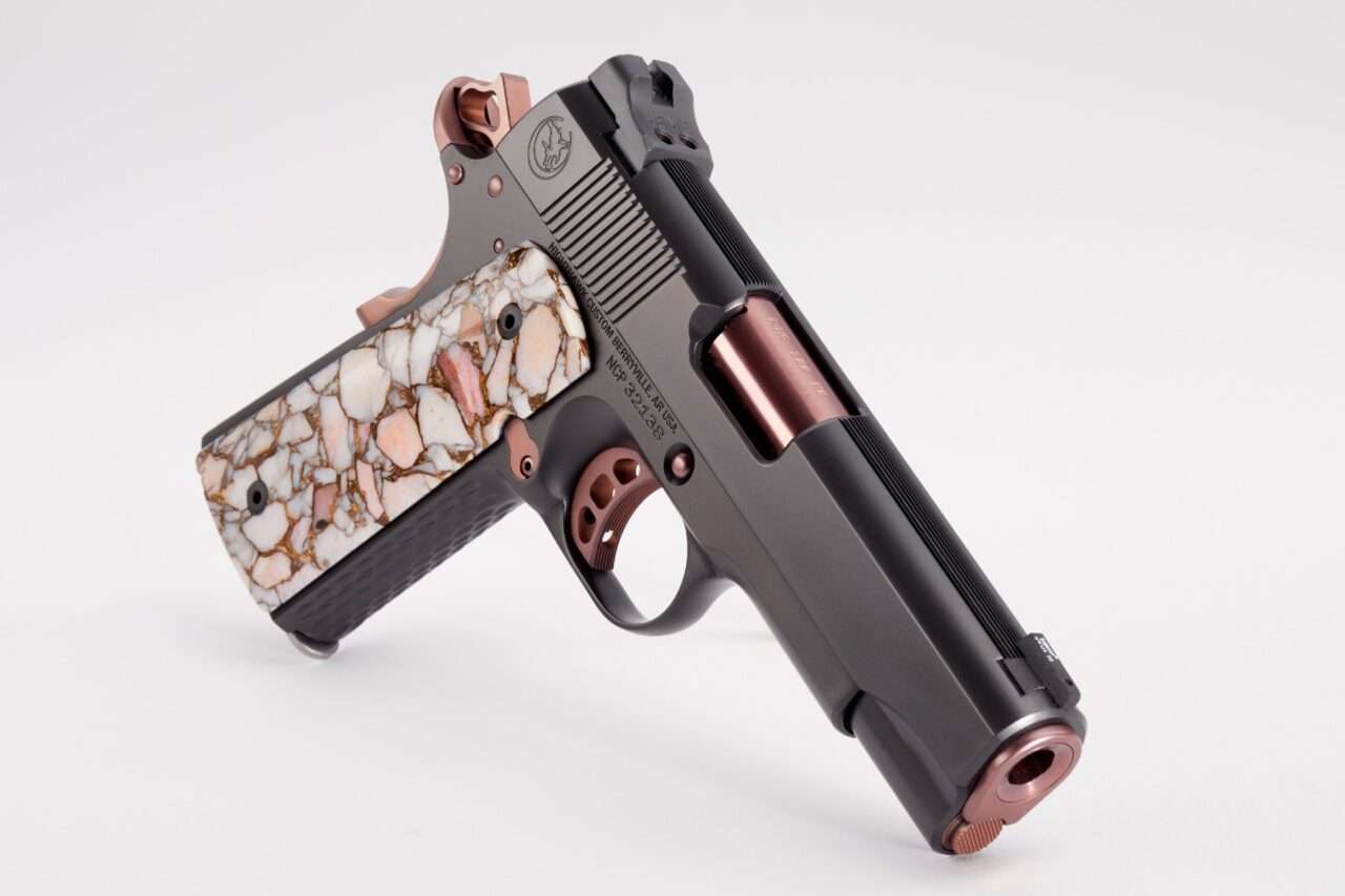 NIGHTHAWK CUSTOM LADY HAWK 2.0 9MM TOP RIGHT SIDE VIEW MUZZLE ANGLED DOWN