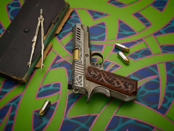 CABOT GUN OF THE MONTH DECEMBER SAGUARO 4.25" 45ACP RIGHT SIDE VIEW LAYING FLAT FACING UP