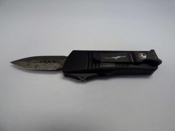 MICROTECH TROODON MINI DOUBLE EDGE SIGNATURE SERIES DAMASCUS STANDARD RINGED HARDWARE CLIP SIDE