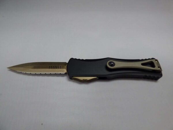 MICROTECH HERA DOUBLE EDGE BRONZE FULL SERRATED WITH BRONZED HARDWARE BLACK MARBLE IN CLIP BLADE OUT CLIP SIDE