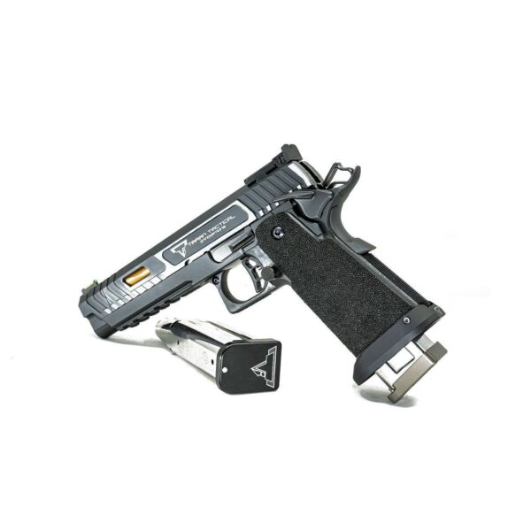 TARAN TACTICAL JOHN WICK 3 COMBAT MASTER SIGHT BLOCK .40S&W TOP RIGHT SIDE VIEW MUZZLED ANGLED DOWN WITH MAGAZINE