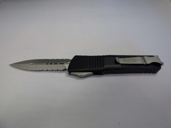 MICROTECH COMBAT TROODON DOUBLE EDGE STONEWASH PARTIAL SERRATED SILVER HARDWARE BLADE OUT CLIP SIDE