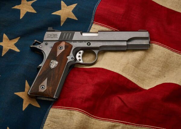 CABOT GUNS THE VINTAGE CLASSIC 5" .45 RIGHT SIDE VIEW AMERICAN FLAG BACKGROUND