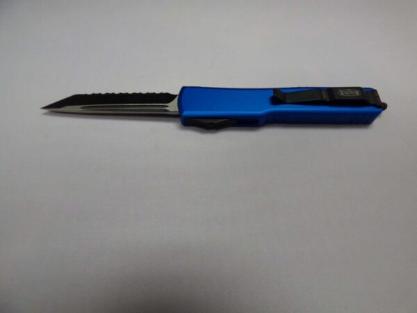 MICROTECH UTX70 TANTO EDGED BLUE FULL SERRATED BLACK BLADE/HARDWARE BLADE OUT CLIP SIDE