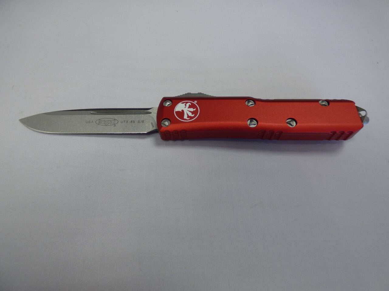 MICROTECH UTX85 SINGLE EDGE RED STONEWASH STANDARD SILVER HARDWARE BLADE OUT CLIP SIDE