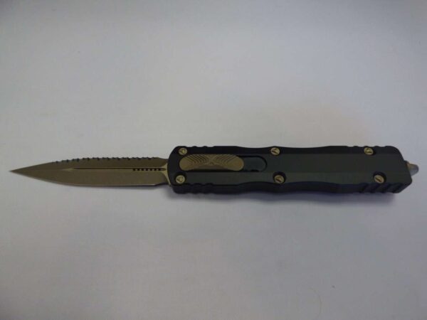 MICROTECH DIRAC DELTA DOUBLE EDGED BRONZED APOCALYPTIC FULL SERRATED CLIP SIDE