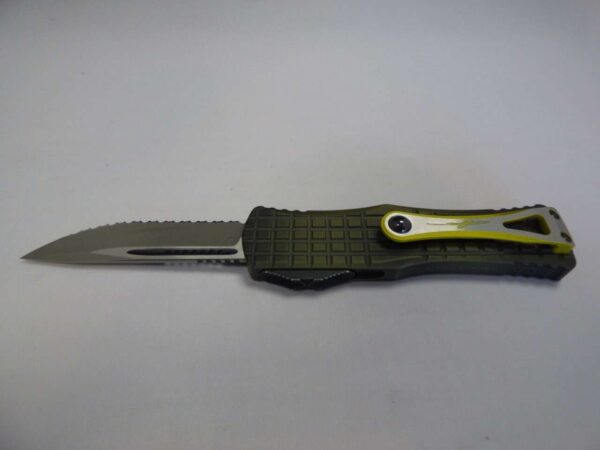 MICROTECH HERA SINGLE EDGED FRAG SIGNATURE SERIES GRENADE GREEN APOCALYPTIC FULL SERRATED EDGE UP