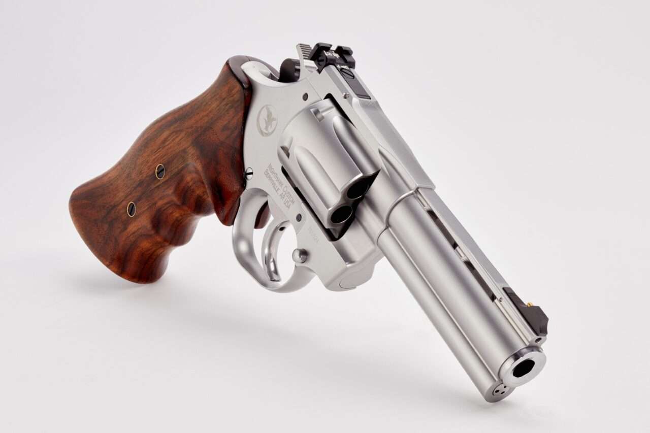 KORTH SILVER MONGOOSE 4" SILVER DLC .357 MAGNUM LEFT SIDE VIEW REAR ANGLE CYLINDER OPEN