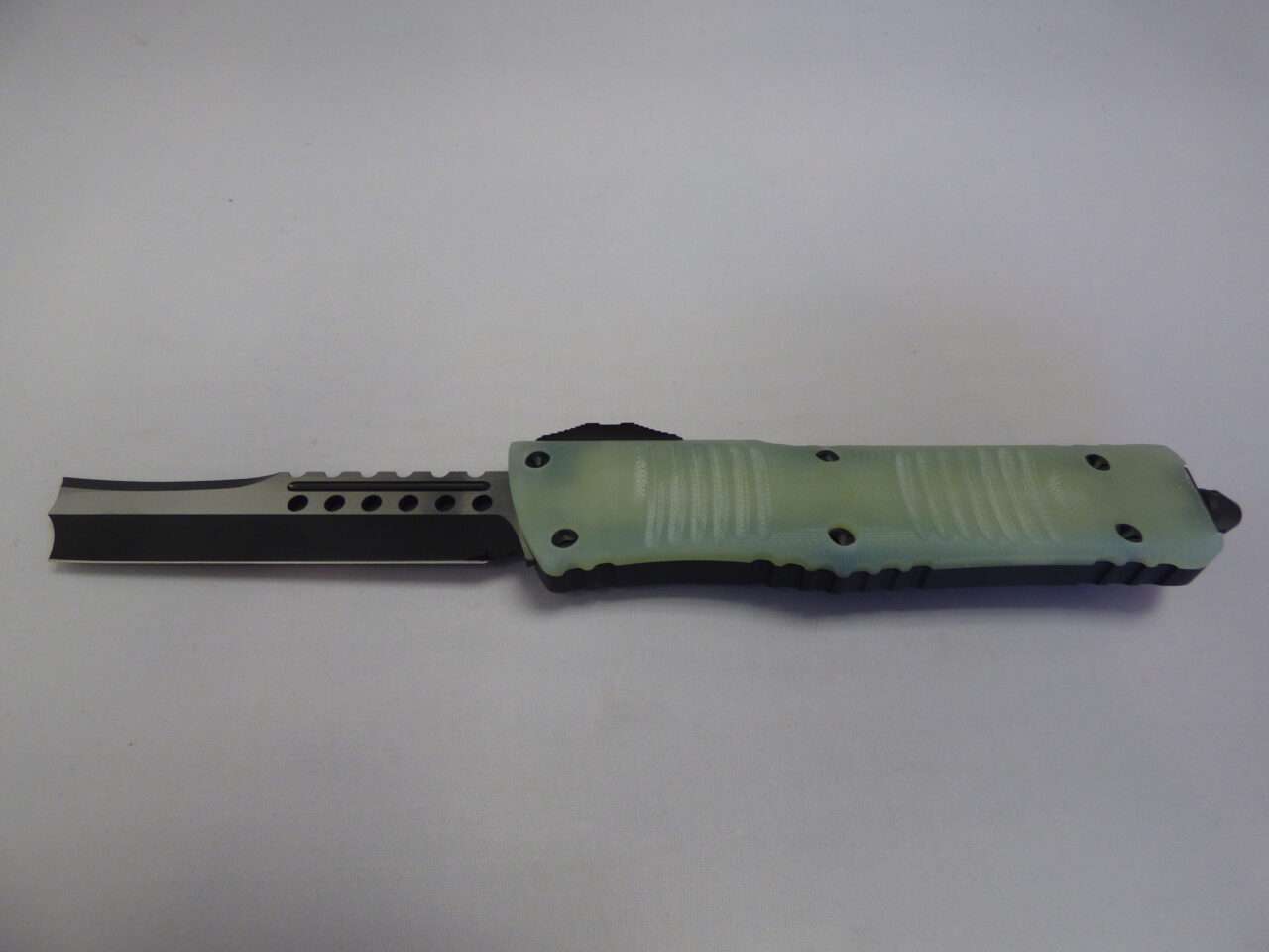 MICROTECH COMBAT TROODON HELLHOUND RAZOR SIGNATURE SERIES JADE GREEN G-10 COMPOSITE TOP STANDARD LABEL