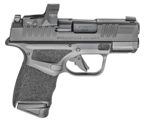 SPRINGFIELD ARMORY HELLCAT OSP WITH WASP OPTIC TOP LEFT SIDE VIEW FRONT ANGLE EXTENDED MAGAZINE