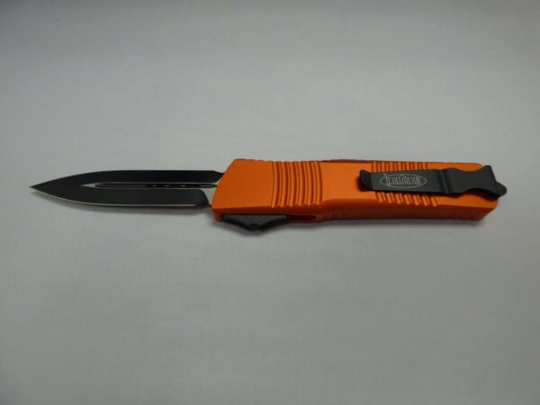 MICRTOECH COMBAT TROODON DOUBLE EDGE ORANGE STANDARD BLACK BLADE/HARDWARE CLIP SIDE